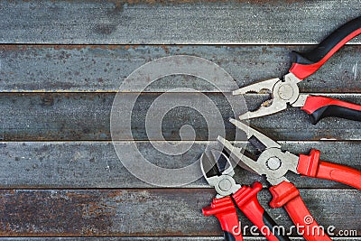 The pliers, on the old rusty table. Stock Photo