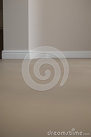 Plinth on laminate. the floor of a new apartment Stock Photo