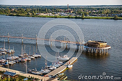 Plock, Poland, Europe - August 12, 2021. Pier over river Vistula ending by Molo Cafe refreshment Editorial Stock Photo