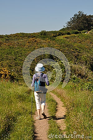 Hiker on the gr at Plouha Editorial Stock Photo
