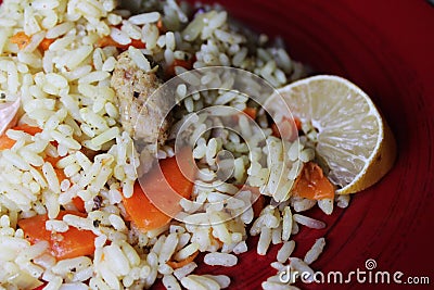 Plov. Vegan fresh tasty dish. rise with carrot, soya meat and garlic Stock Photo