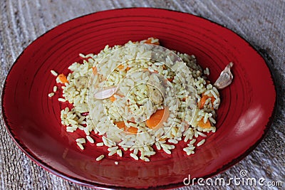 Plov. Vegan fresh tasty dish. rise with carrot, soya meat and garlic Stock Photo