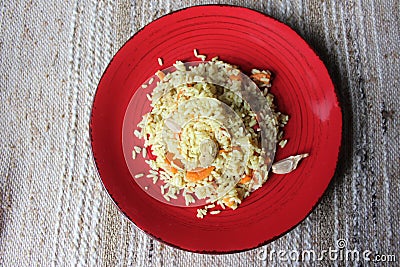 Plov. Vegan fresh tasty dish. rise with carrot, soya meat and garlic Stock Photo