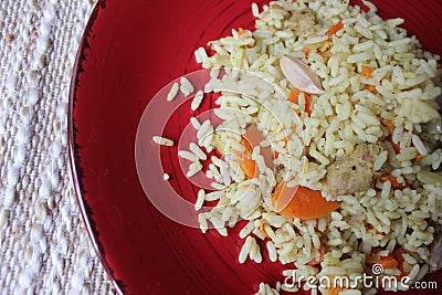 Plov. Vegan fresh tasty dish. rise with carrot, soya meat and garlic Stock Photo