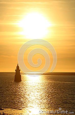 Plover Scar lighthouse River Lune estuary sunset Stock Photo