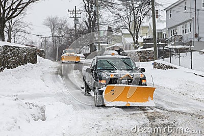 Plow trucks on street after storm 2015 Editorial Stock Photo