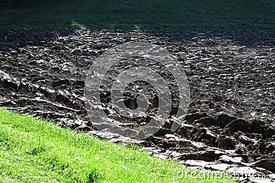 Plowed soil steaming Stock Photo