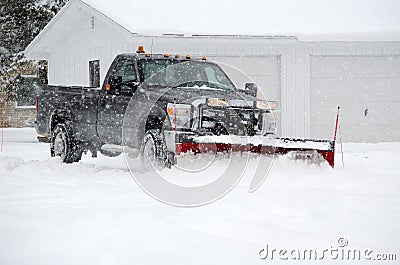 Plowing snow Stock Photo