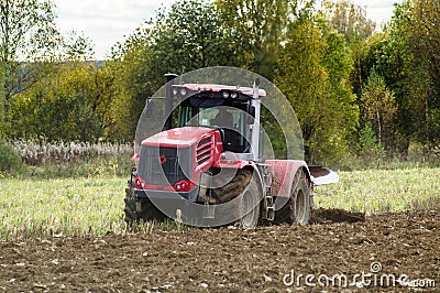 Plowing tractor. Editorial Stock Photo