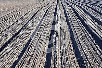 plows by a field of Toten Stock Photo