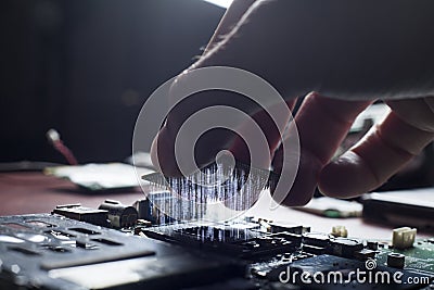 Plug in CPU microprocessor to motherboard socket Stock Photo