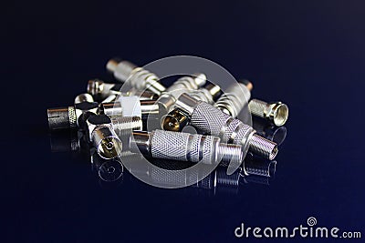 Plug on a dark background. Telecommunications connectors for building a telecommunications network. Dark background Stock Photo