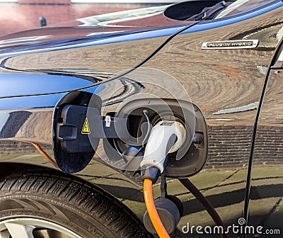 Plug in hybrid electric car charge point Editorial Stock Photo