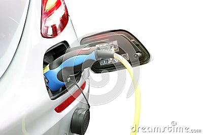 Plug of power cable electric supply during charging at ev car electric vehicle charging isolated on white background with Stock Photo