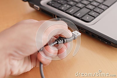 Plugging In The USB Cable Stock Photo