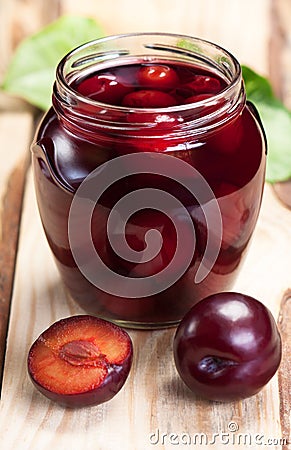 Plum compote in jar. Stock Photo