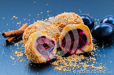 Plum dumplings. Traditional homemade sweet plum dumplings. Stock Photo