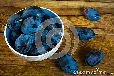 Plum prunes on a wooden table Stock Photo