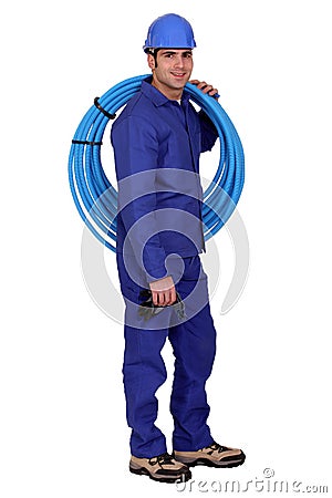 Plumber with blue pipe Stock Photo