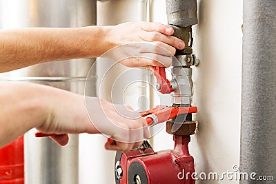 Plumber hands working with pipeline connections Stock Photo