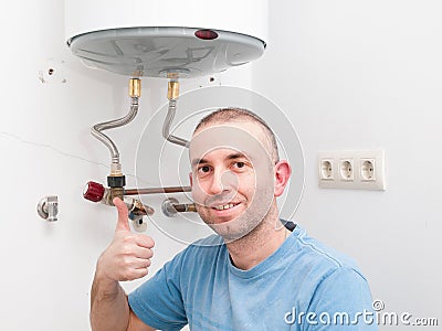 Plumber Man expressing positivity with ok symbol with hand Stock Photo