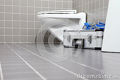 plumber tools and equipment in a bathroom, plumbing repair service, assemble and install concept, copy space template Stock Photo