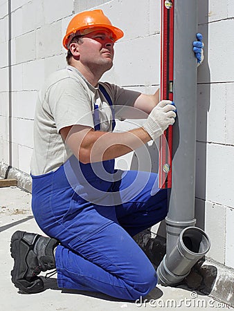 Plumber at work Stock Photo