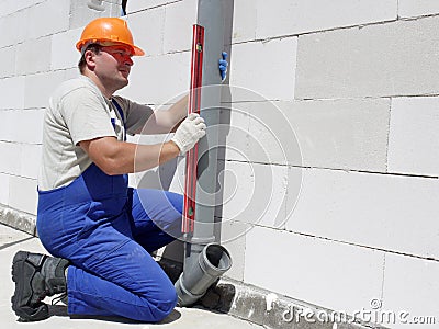 Plumber at work Stock Photo