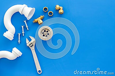 Plumber work with instruments, tools and gear on blue background top view mockup Stock Photo