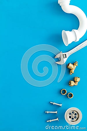 Plumber work with instruments, tools and gear on blue background top view mockup Stock Photo