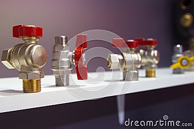 Plumbing ball taps in the store Stock Photo