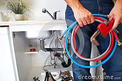 Plumbing tools on the kitchen. Stock Photo