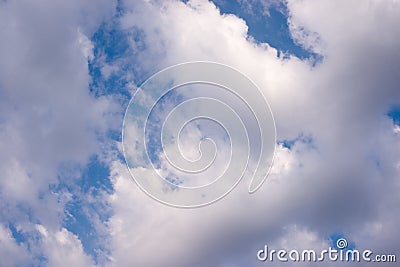 Plump white clouds in blue sky Stock Photo