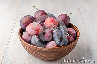 Plums on a light background. Stock Photo