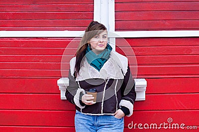 Plus size model in winter look with coffee Stock Photo