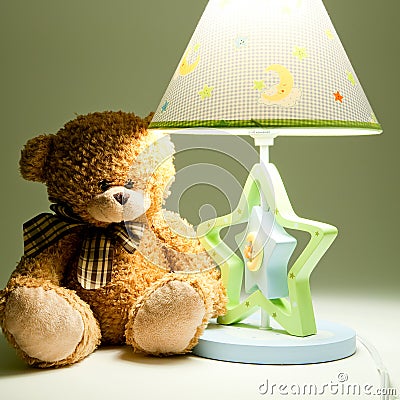 Plush bear and lamp Stock Photo