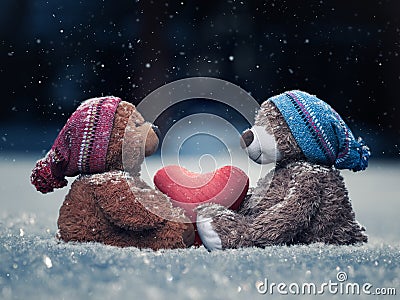 Plush bears with a heart in paws Stock Photo