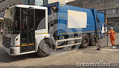 Refuse truck leaving site in Plymouth City Centre, UK Editorial Stock Photo