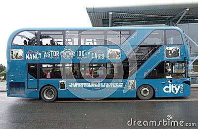 Plymouth England. Centennial memorial on side of a bus to Lady Nancy Astor. Editorial Stock Photo