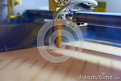 Plywood laser cutting process close up Stock Photo