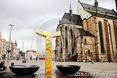 PLZEN, CZECH REPUBLIC - JUNE 5: The modern golden fountain on the Republic square Editorial Stock Photo