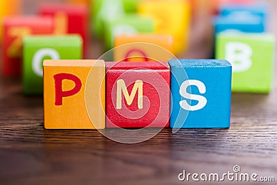 PMS Word Made With Blocks Stock Photo