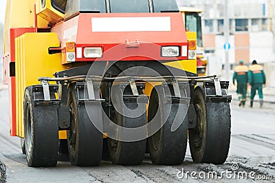 Pneumatic asphalt roller at work Stock Photo