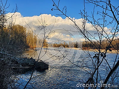 PNW blue sky riverside nofilter Stock Photo