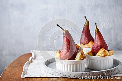 Poached pear in red wine. Dessert Stock Photo