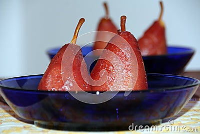 Poached pear in red wine Stock Photo
