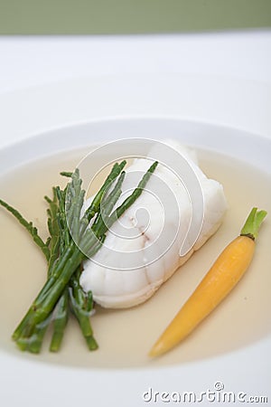 Poached Sea Bass in Broth Stock Photo