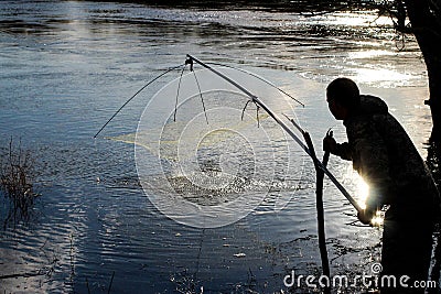 Poacher fishing net in spawning season Stock Photo