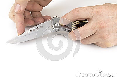 Pocket folding knife on the white background. Stock Photo