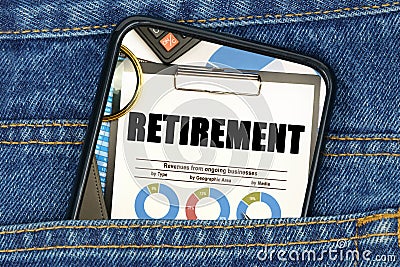 In a pocket of jeans there is a smartphone on the screen of which the text - RETIREMENT Stock Photo